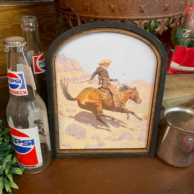 Canvas Print of cowboy on Horse Arch Frame
