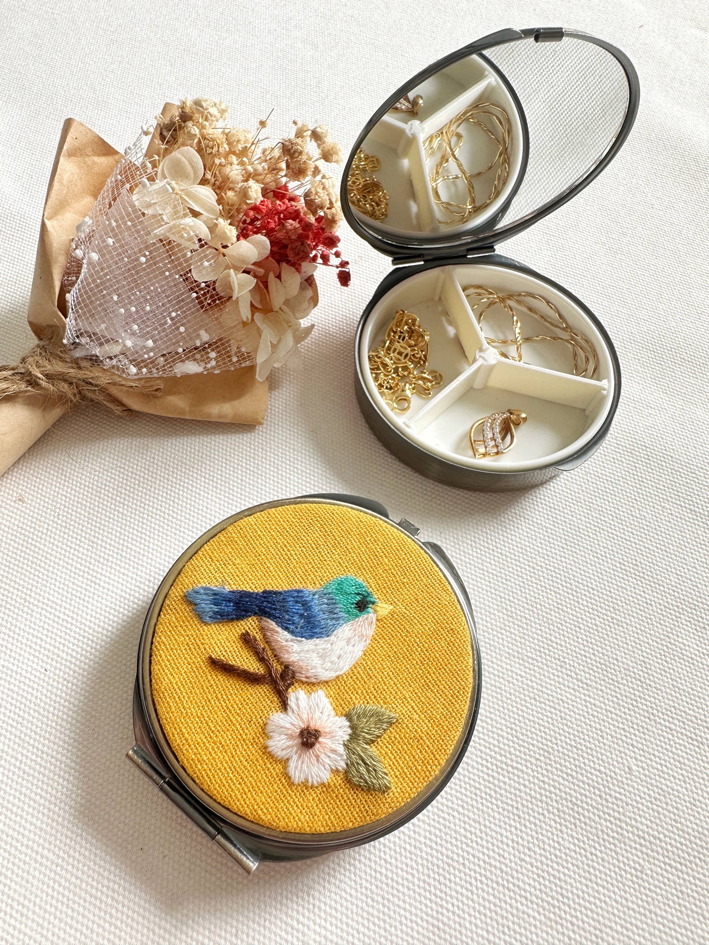 Floral Embroidered Round Jewelry Box With Mirror
Success: 4. Bird